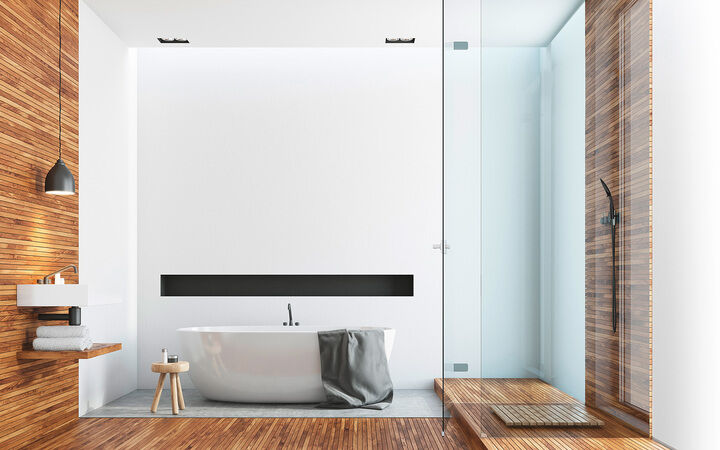 Ein modern eingerichtetes Badezimmer in warmen Naturtönen Ein modern eingerichtetes Badezimmer in warmen Naturtönen