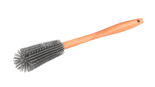 Eine Spülbürste aus Silikon mit Holzgriff
